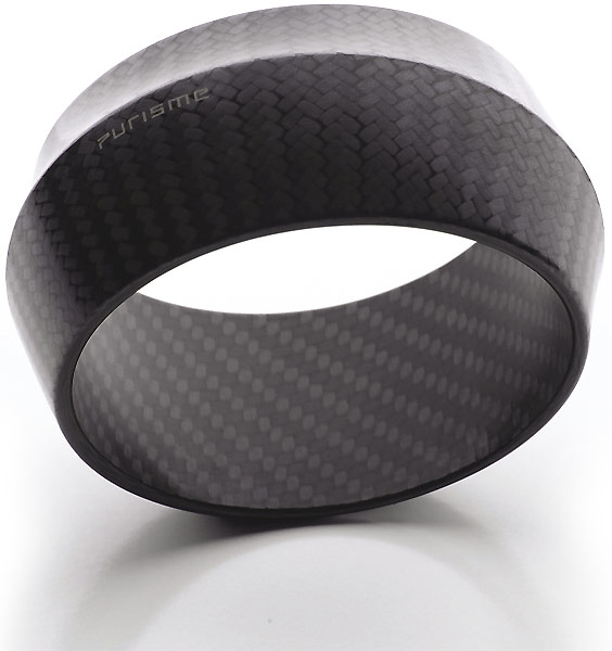 In spring 2009 the Austrian design label Purisme presented its fourth product after the pipe, the letter opener and the Yoyo for adults: a bracelet with the impression of a black diamond. 