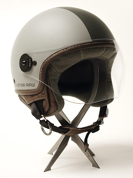 In January 2009 G-Star delivers the new motorcycle helmet 'GS Helmet' in open-faced, vintage racer-style design inspired by air force pilots. The Amsterdam based company follows a trend which spans in the meanwhile over the whole world and is celebrated in cities such as Paris, New York, London ... 