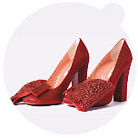 The Wizard of Oz Ruby Slipper Collection by world-famous designers/labels such as Alberta Ferretti, Betsy Johnson, Christian Louboutin, Diane Von Fürstenberg, Jimmy Choo, L.A.M.B. by Gwen Stefani, Manolo Blahnik, Moschino, Oscar de la Renta, Sergio Rossi, Stuart Weitzman, Tuleh, ... How to perform magic with top designer shoes to help children and families who are living with HIV/AIDS ...