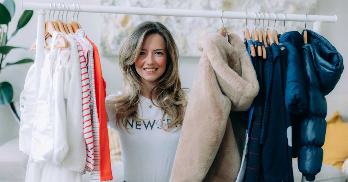 Caroline Schober, co-founder of Neworn, beside a rack of children’s clothes. The start-up promotes circular kids’ fashion. Photo by Laurenz Vavrovsky.