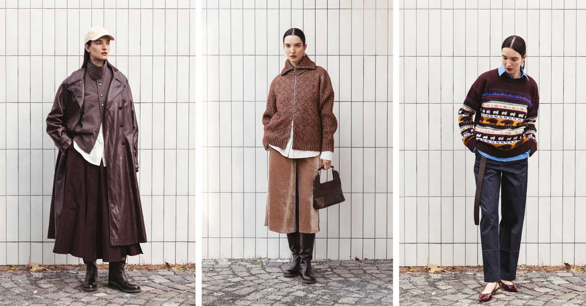 Nehera FW25 collection inspired by the flâneur – burgundy leather coat with earthy layers, brown knit blouson with velvet trouser-skirt, and burgundy patterned sweater with trousers. Photos: Courtesy of Nehera.