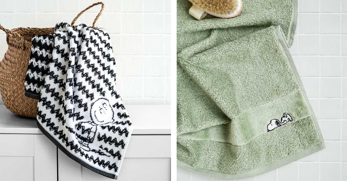 Charlie Brown towel in black-white zigzag and green towel with sleeping Snoopy from the limited Vossen X Peanuts edition.