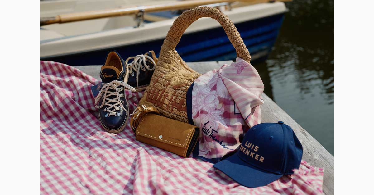 Luis Trenker SS2026 accessories on picnic blanket by water in Vienna setting