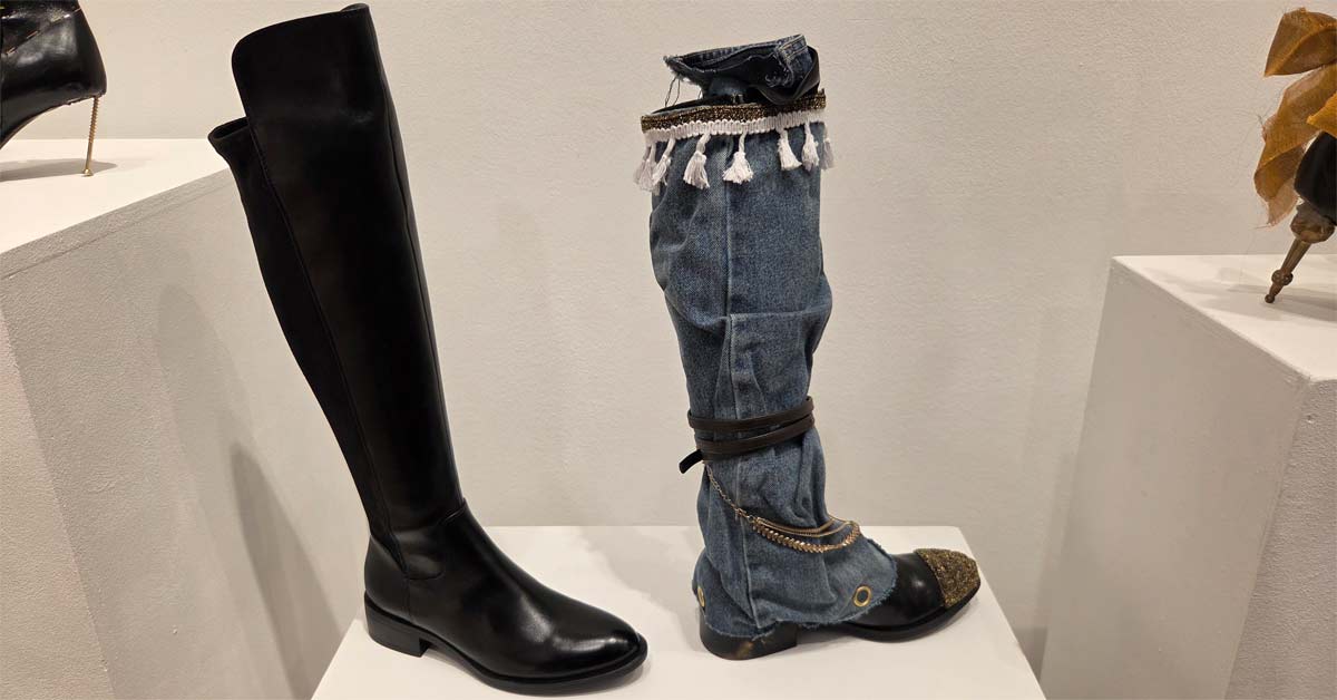 Black boot with denim and gold details from the student project Wrapped in Strength.