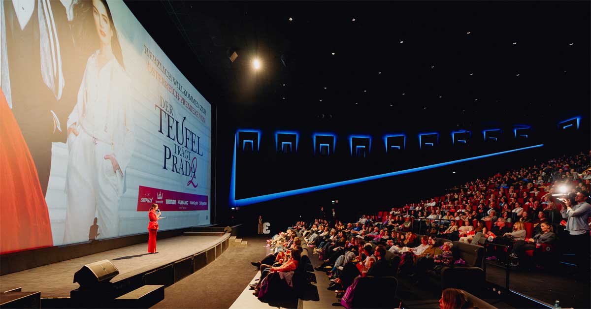 Cinema audience at Vienna premiere of The Devil Wears Prada 2 with stage presentation