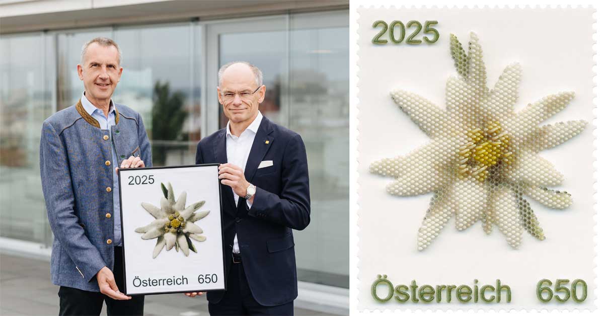 Two men present Austria's new 3D-printed Edelweiß stamp, featuring a tactile white flower motif produced by Hämmerle & Vogel.