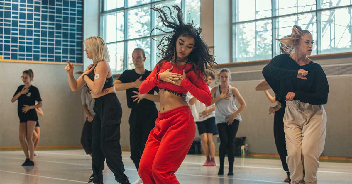 A diverse group of dancers of various ages participate in the 'FemFunk' workshop led by Jermaine Browne (US) at a dance studio. Photo: © yakoone.