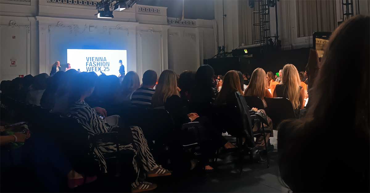 Organizers introduce Vienna Fashion Week 2025 opening show inside Halle E at MuseumsQuartier.