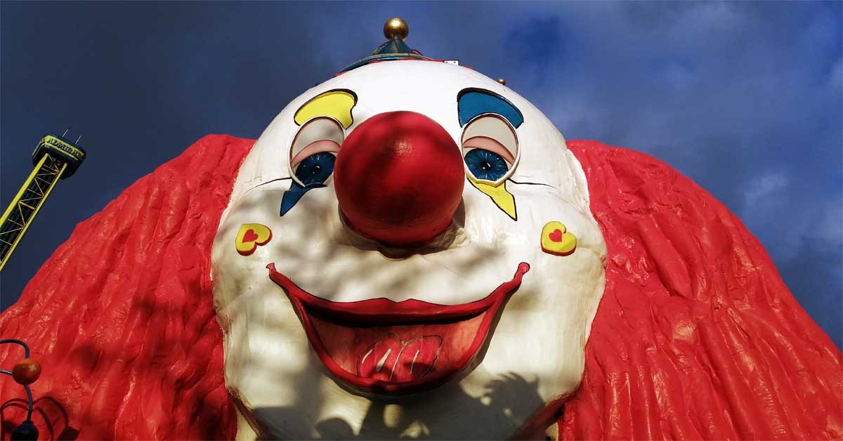 Clown face on a carousel ride at the historic Wurstelprater amusement park in Vienna.