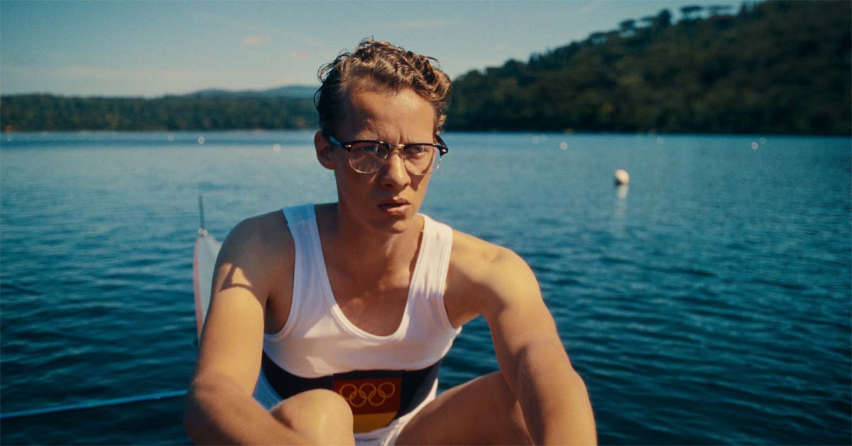 Felix Kammerer as Hans Lenk rowing on a lake in 'Adams Acht'