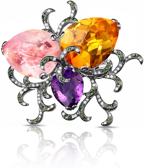 Fei Liu: Ring from the Fei Liu Whispering collection. The essence of the Whispering collection is that of boldness and colour. With entwining petal-like shapes, the three-stone ring is set within a different gold setting. The ring is coloured with a 16ct Citrine set in an 18K yellow gold, a 15ct Rose Quartz set in 18K rose gold, and also a 4.3ct Amethyst set in 18K black rhodium plated white gold (black gold).