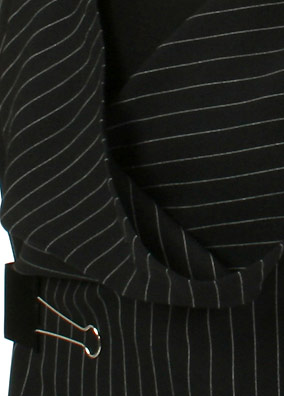 In March the Viennese label for design, fashion, architecture 'Liniert' by the Barcelona born fashion designer Ivon Gasque and the Viennese architect Christian Kollarovits presented on occasion of the international increasing awareness for the causes of the worldwide crisis a 'pinstriped collection'. In German language the 'pinstriped suit' has two meanings: it means the 'banker suits" or 'jail house suits'. 