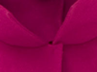 Australian born, at the rue Charlot, Paris based designer Martin Grant presents for fall/winter 2009/10 dresses and coats with surprising details on structure (collars) and volume (pleats). In this collection magenta flashes over the shadow and asphalt grey, powder rose, night blue and black pieces of day and evening wear made of silk, wool, angora, gauze. The designer, who strongly works from his own personal view on fashion presents his unhasty collections to a small, selected audience which knows about the value to be excited by simplicity. 