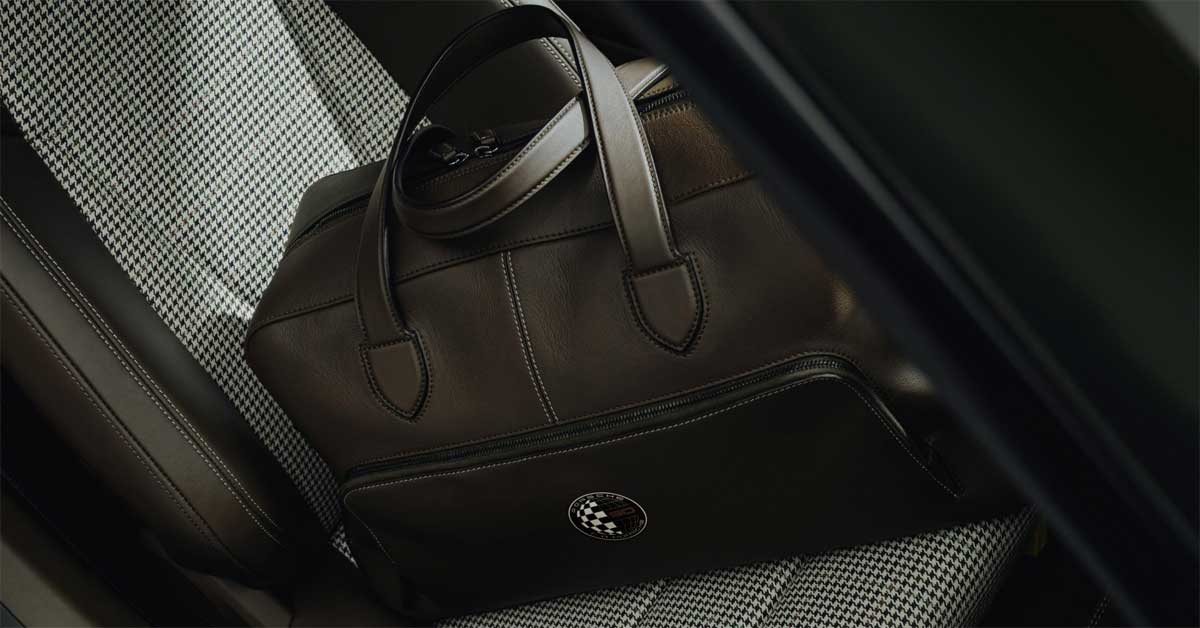 Leather Porsche Design weekender with fabric lining inspired by the jacket pattern associated with F. A. Porsche and translated into the 911 GT3 90 F. A. Porsche anniversary interior.