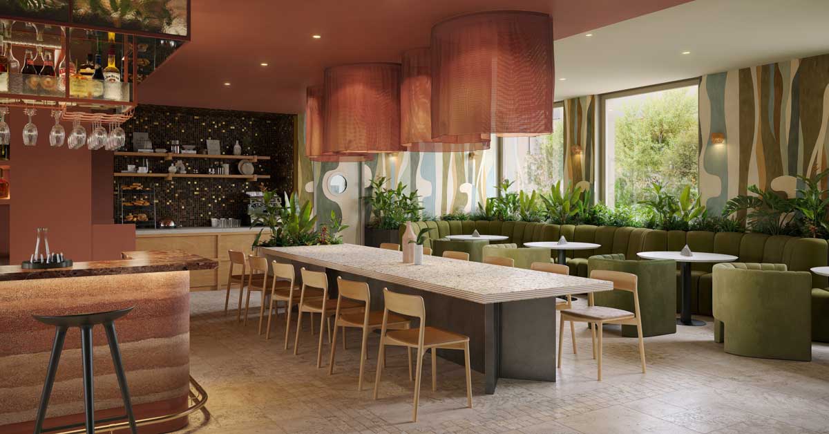 Modern hotel bar and dining area with green seating and warm lighting in Vienna