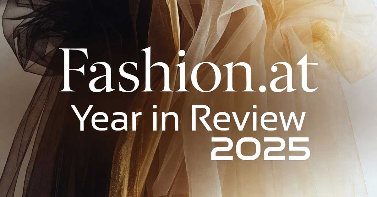 Fashion.at Year in Review 2025 title on layered tulle background
