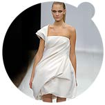 DICE KAYEK SS09 - 'Tourbillon' (transl. 'whirlwind') is the name of Ece Ege's spring/summer 2009 collection. It is a delicious whirlwind of sculptured dresses with graphical, asymmetric folds. She plays with constructions like an architect to bring volume into the 'tourbillon' ...