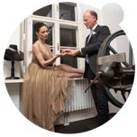 The image shows soloist Ludmila Konovalova and Wolfgang Koechert at the workshop at the headquarters of A. E. Köchert in Vienna. 