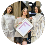 Minerva Skyttä wins the FASH 2025 knitwear award with a sculptural collection inspired by family archives, presented at Berlin Fashion Week.